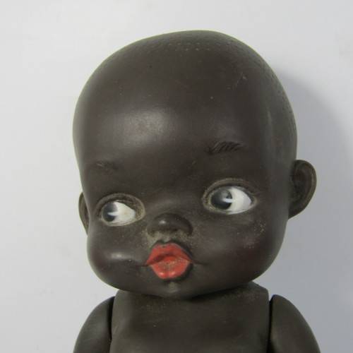 Pair of vintage African rubber dolls