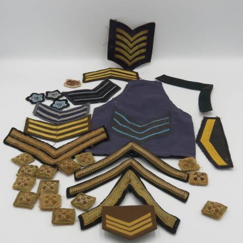 Large lot of military rank badges