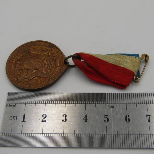Antique Union of South Africa medallion with ribbon