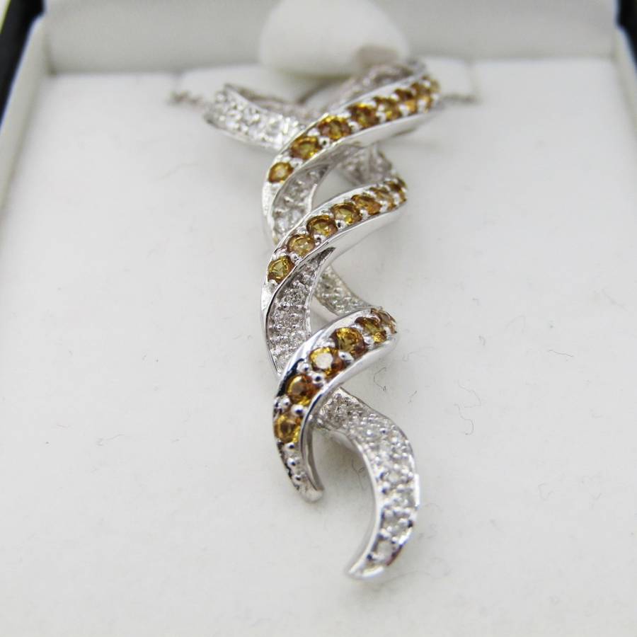 18kt White gold pendant with diamonds and yellow sapphires with 9kt white gold necklace