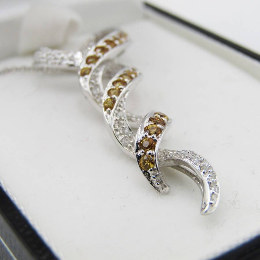 18kt White gold pendant with diamonds and yellow sapphires with 9kt white gold necklace