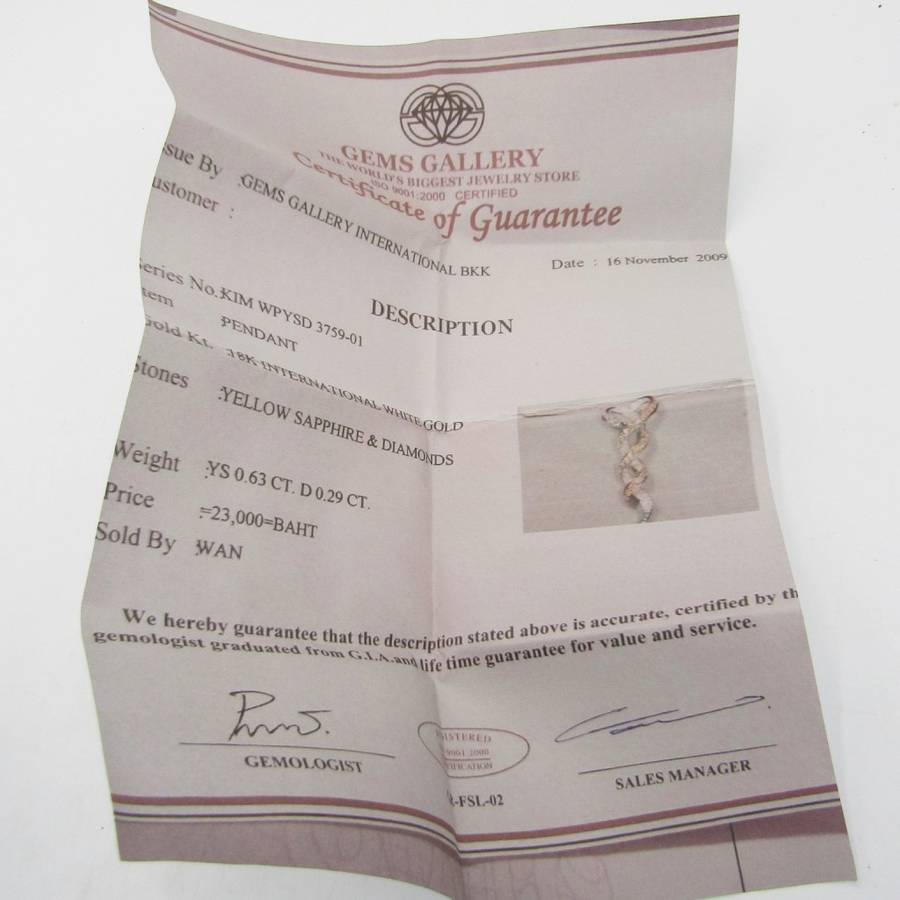 18kt White gold pendant with diamonds and yellow sapphires with 9kt white gold necklace