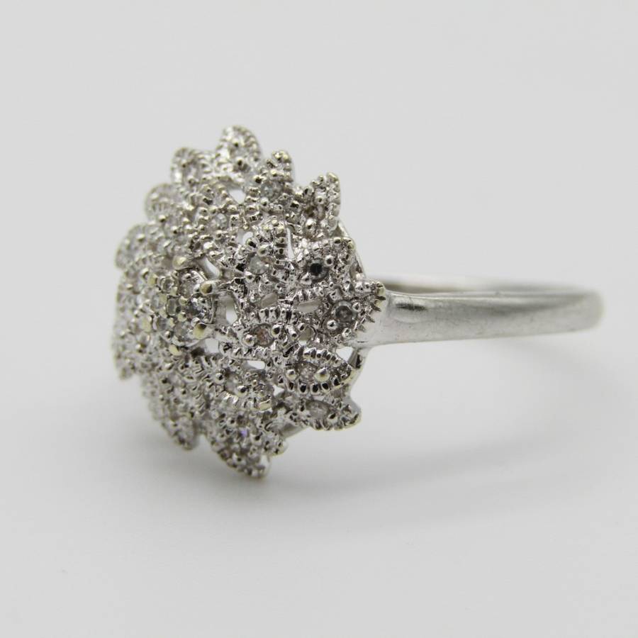 9kt White gold ring with about 30 small diamonds - ring size P