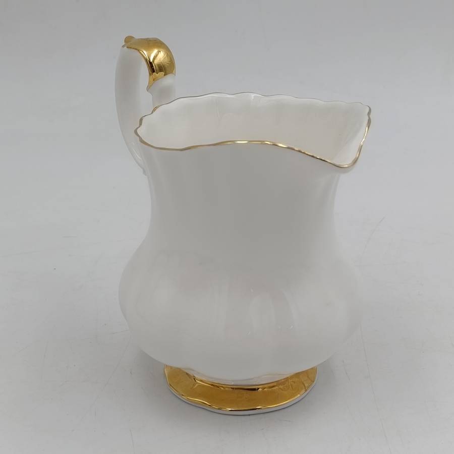 Royal Albert Val d`or porcelain tea set - 6 trios, milk jug and bowl