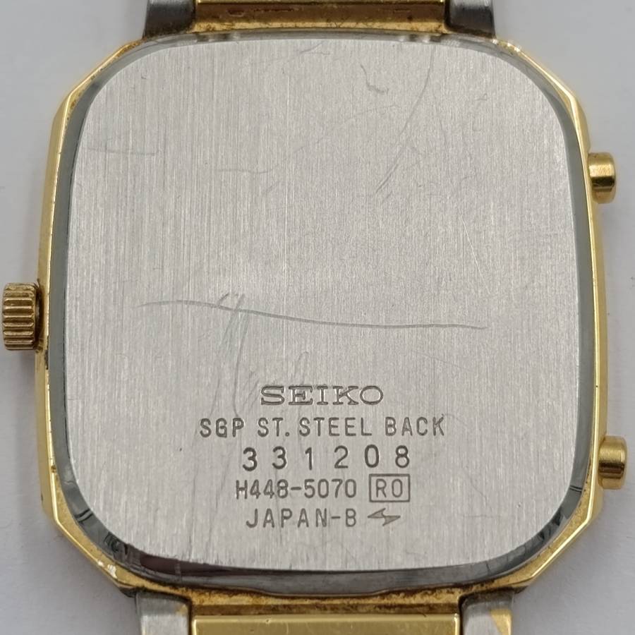 Vintage Seiko Quartz alarm-chronograph analog-digital gold colour mens watch - working