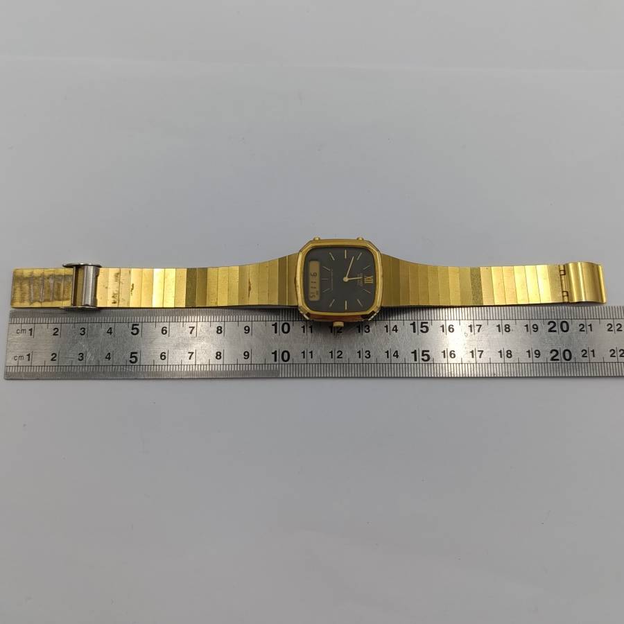 Vintage Seiko Quartz alarm-chronograph analog-digital gold colour mens watch - working