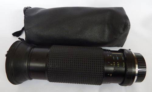 Tokina 100 - 300 zoom lens - Minolta mount - with bag - as per photo