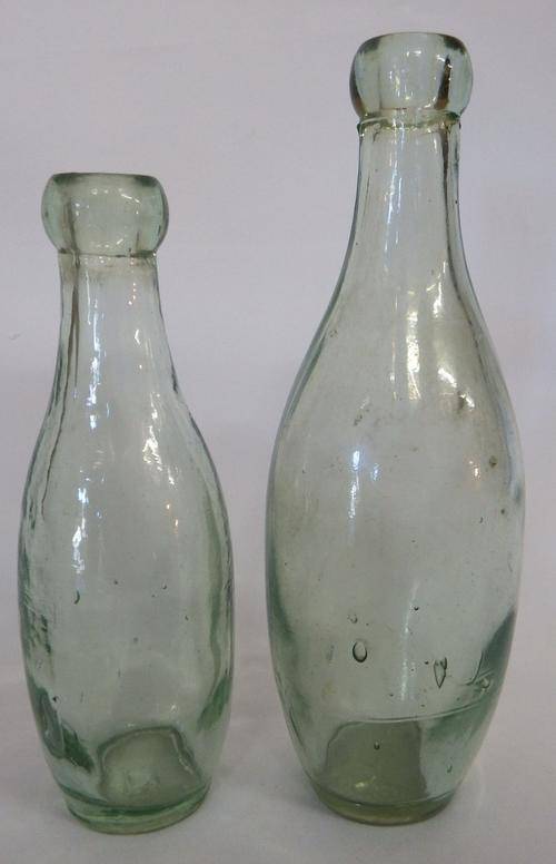 Pair of antique glass bottles - as per photo