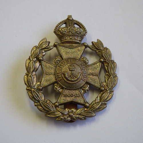 Nottinghamshire and Derbyshire Regt. - Kings crown white metal cap badge with slide