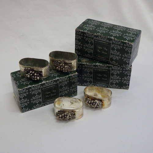 Set of 12 silver plated napkin rings in 3 boxes