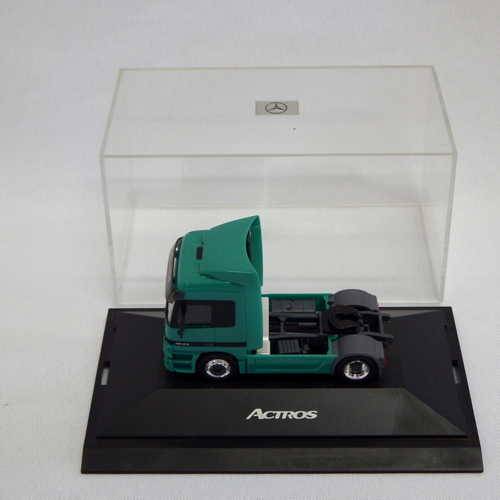 Miniature Mercedes Benz Actros 1843 model truck in case - Herpa