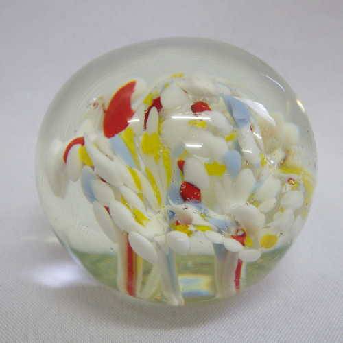 Glass paperweight with floral design