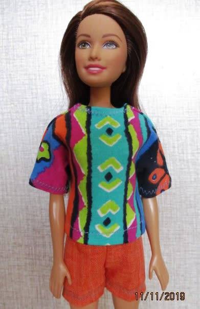 Barbie doll's shorts and bright print T-shirt