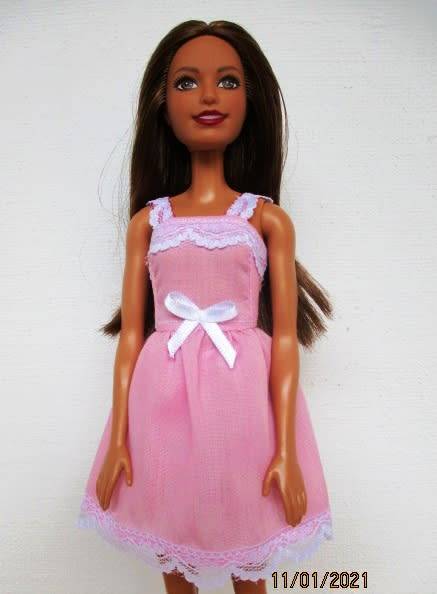 Barbie doll`s sleeping bag and nightie set - pink and yellow brights