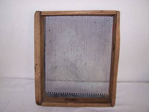 sieve ... great outdoor wall art !!!