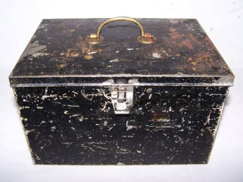 medicine tin...a painted Lennon one with intriguing contents !!!