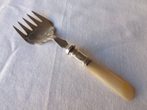 fork ... with a mother of pearl handle !!!
