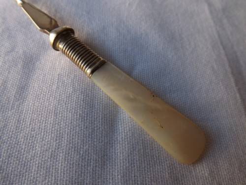 pickle fork ... with a mother of pearl handle !!!
