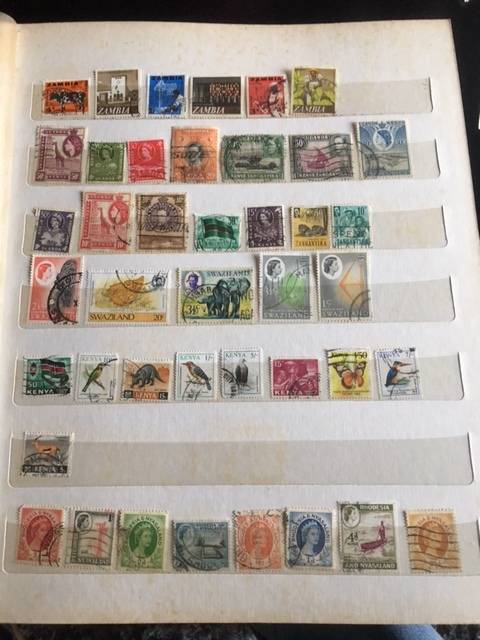 Stamp album with approx 800 stamps.