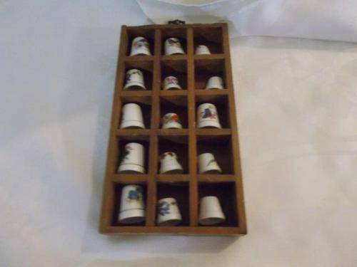 Nice wooden thimble printers tray with thimbles