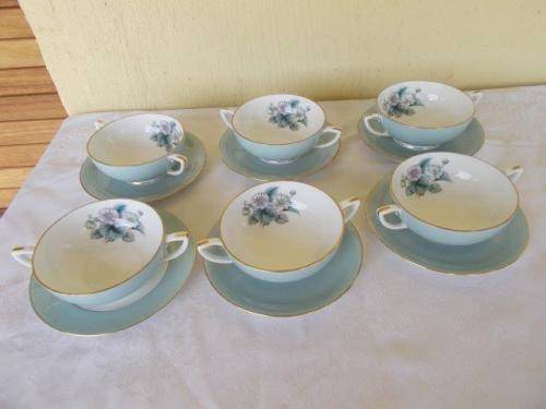 A set of six Royal worcester soup bowl mugs and saucers