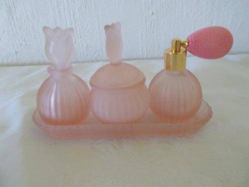 Very pretty pink glass dressing table set on tray