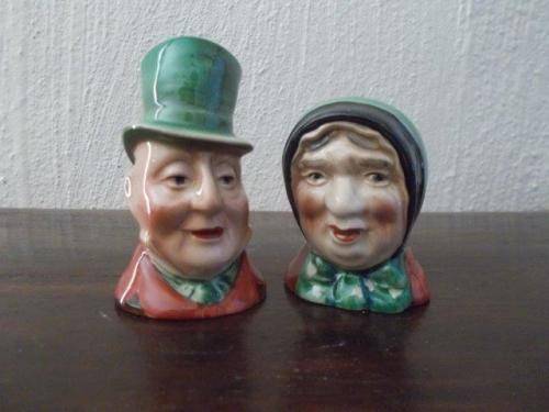 A pair of character beswick salt and pepper set