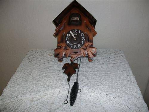 Lovely Rhythm wall battery operated cuckoo clock