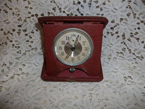 Small fold up wind up travel solora clock