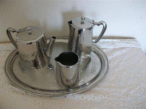 Vintage sliver plated tea pot set on tray