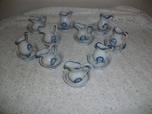 Collection of small blue and white basin and jugs sets