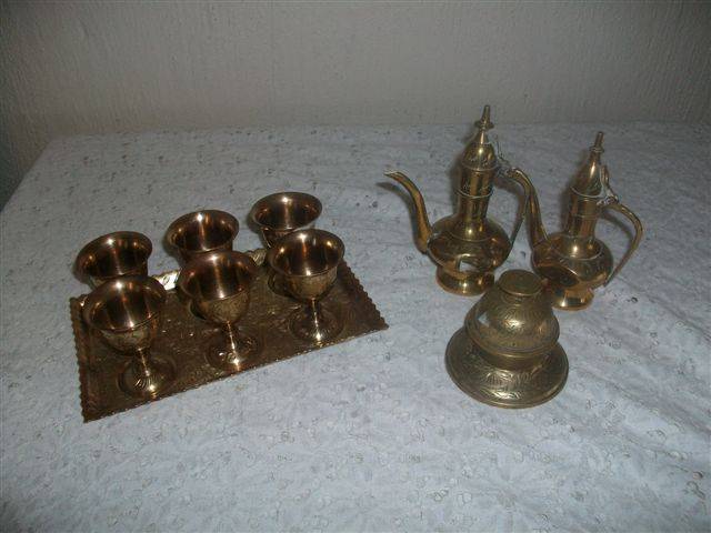 Various brass items including brass small egg goblets on tray etc