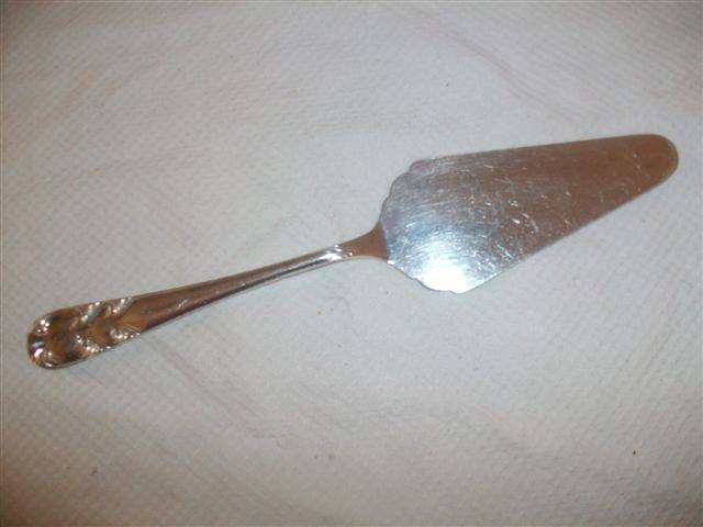 plain looking sliver plated cake lifter