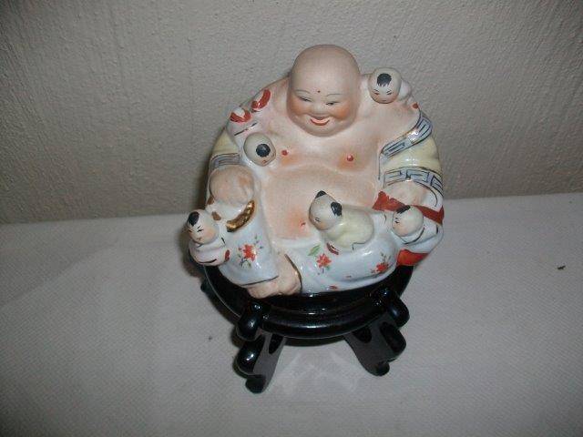 Lovely religious Buddha on stand