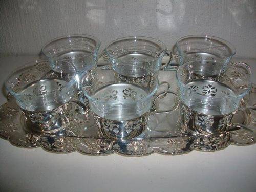 Nice sliver plated tray with a set of six glass cups with sliver plated holders
