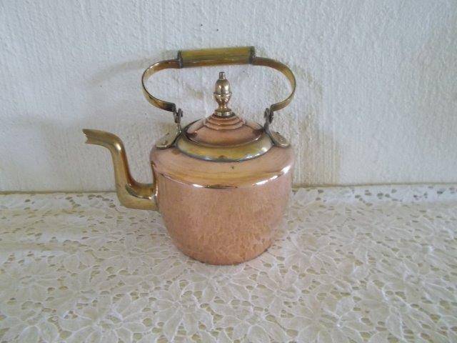 Lovely vintage copper kettle with brass trimings