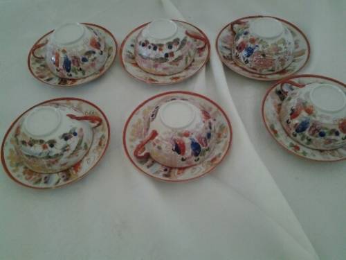A set of six fine oriental red and white tea cup duos