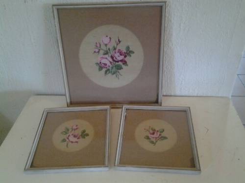 Three beatiful framed rose small tapestries behind glass