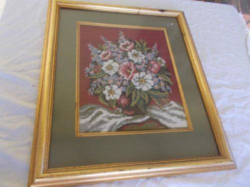 framed nice tapestry of a floral tapestry scene behind glass