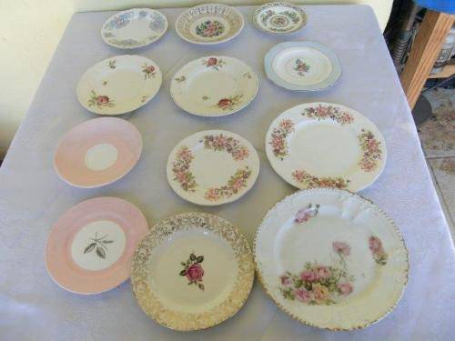 Assorted pretty odd vintage porcelain side plates and saucers job lot