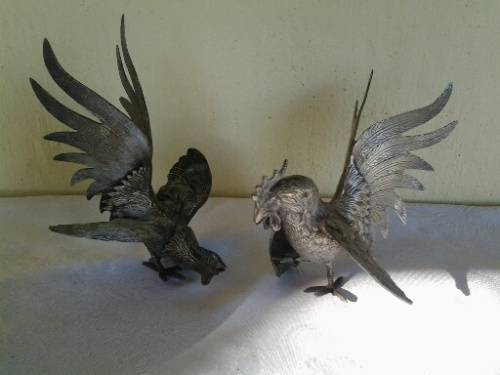 a pair of vintage sliver plated fighting roosters