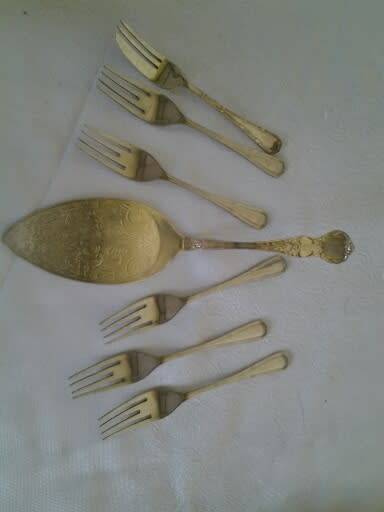 vintage sliver plated cake lifter and six cake forks