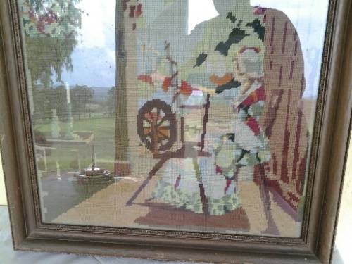 stunning vintage framed vintage scene of woman using her spiningwheel