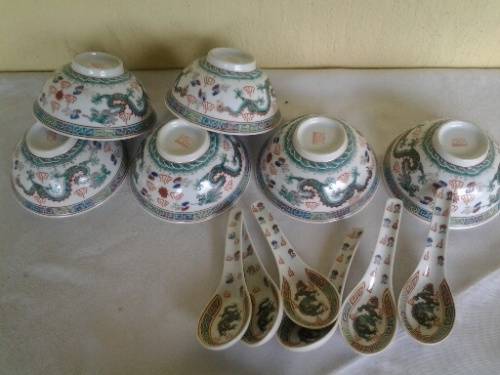a lot of six oriental bowls and spoons
