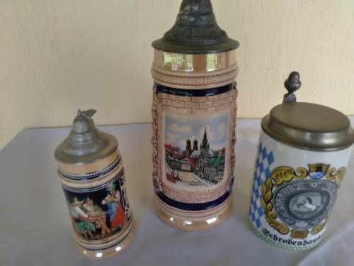 A lot of three collectable stain  mugs