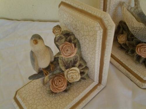 A pair of stunning bird and floral scene bookends