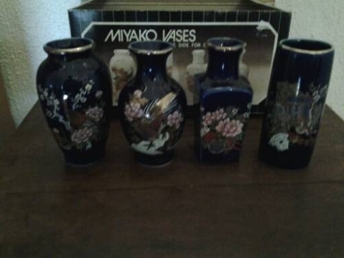 Boxed porcelain a collection of oriental small vases for the collector