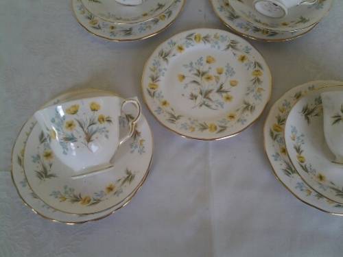 Vintage pretty yellow Colclough lot of four tea cup trios