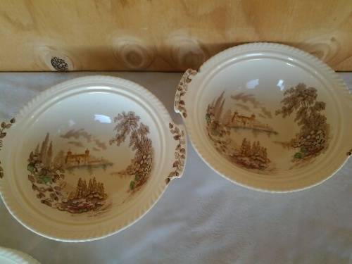 A pair of porcelain veggie dishes with no lids by Johnson brothers castle on the lake scene
