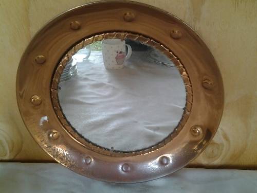Round vintage copper wall mirror